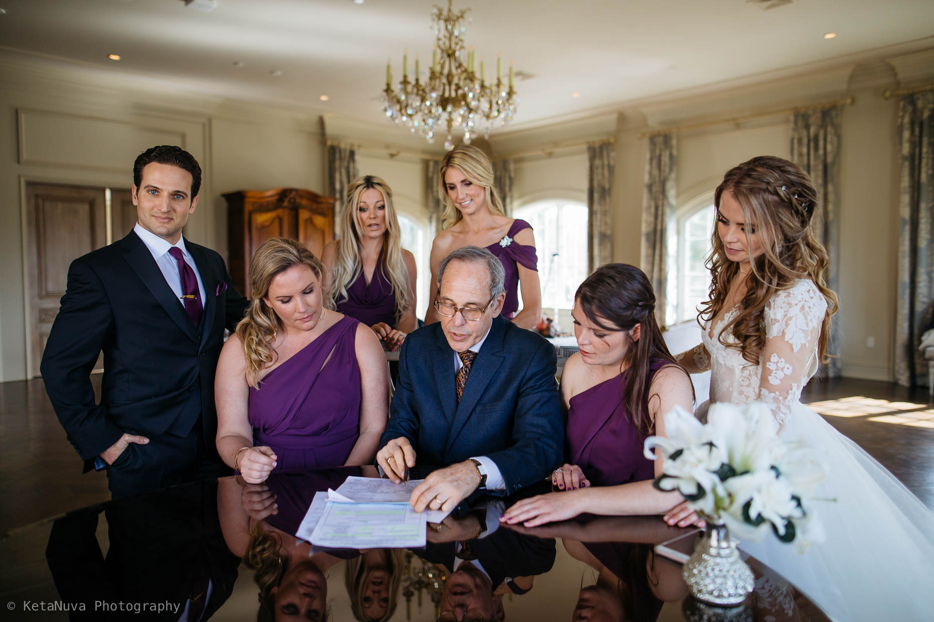 The signing of the marriage certificate. Park Chateau, NJ. 