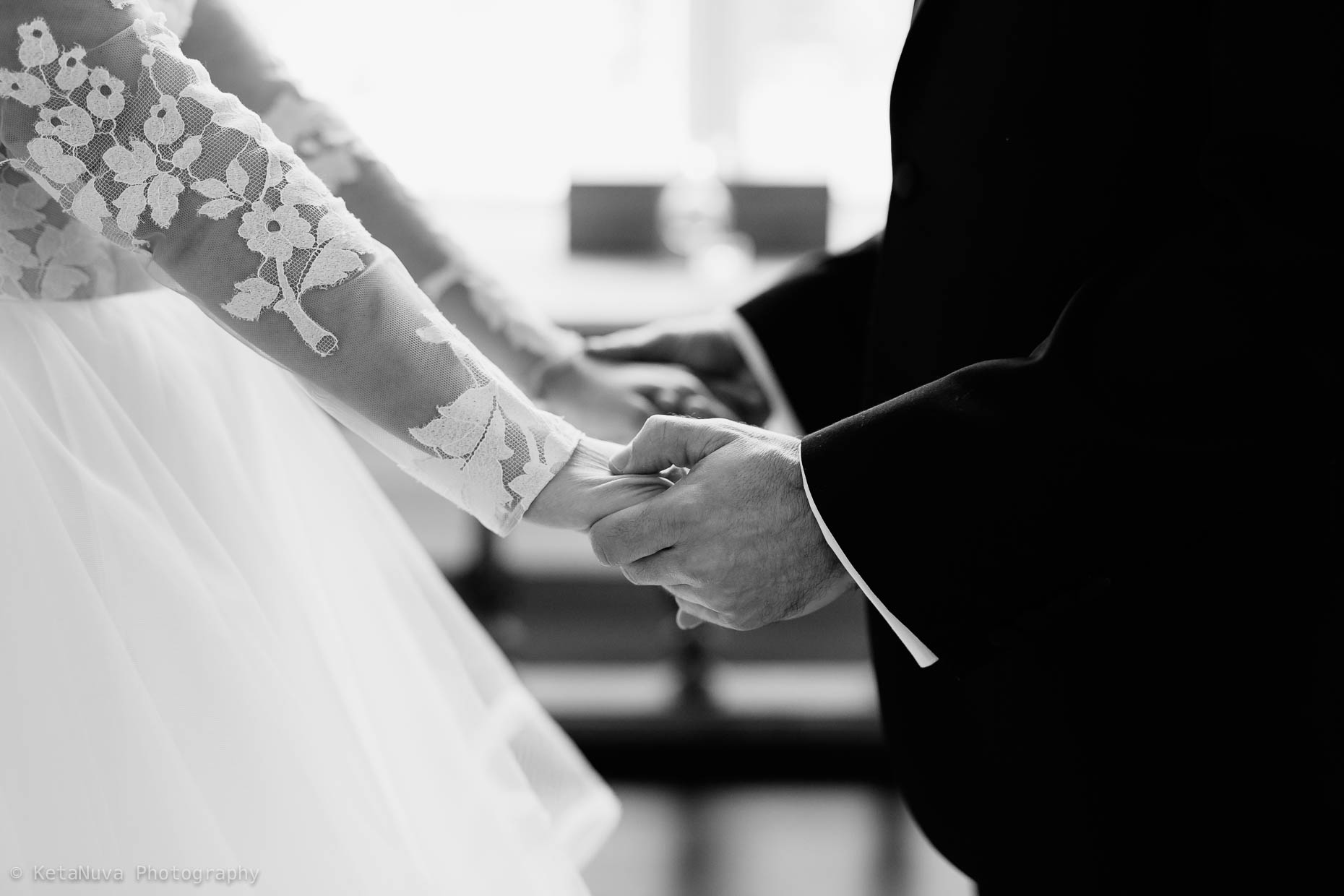 Park Chateau Estate wedding - Bride and groom holding hands. 