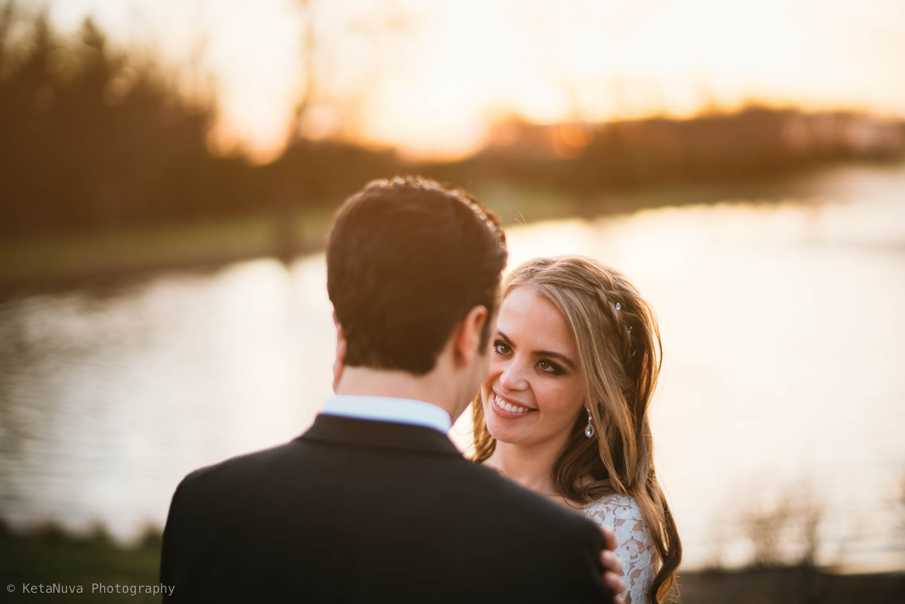 Beautiful golden light photograph of Sara and Bryan at their Park Chateau Estate wedding